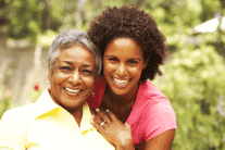 caregiver and her old woman patient